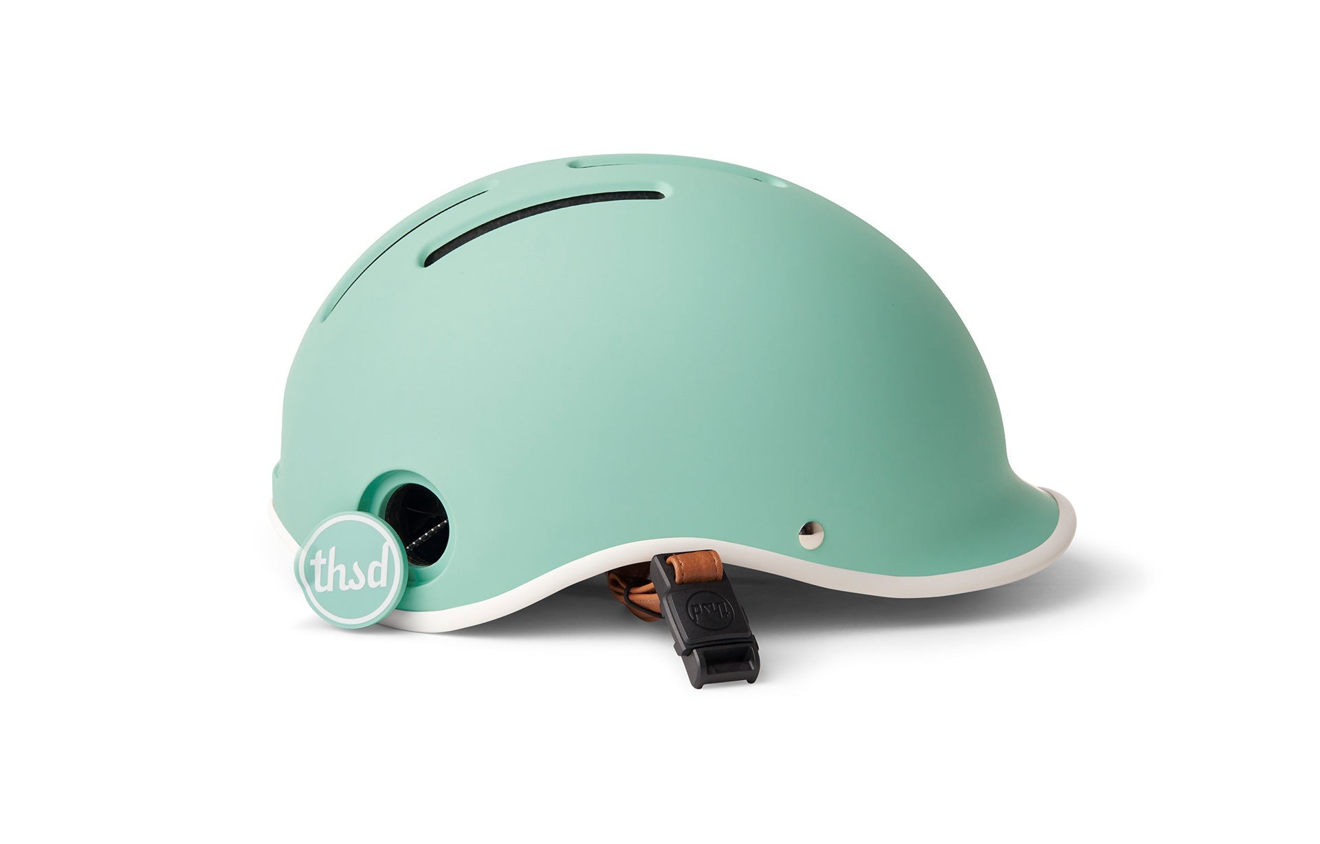 Mint green THSD branded helmet with white lining for cyclists displayed on a white background.