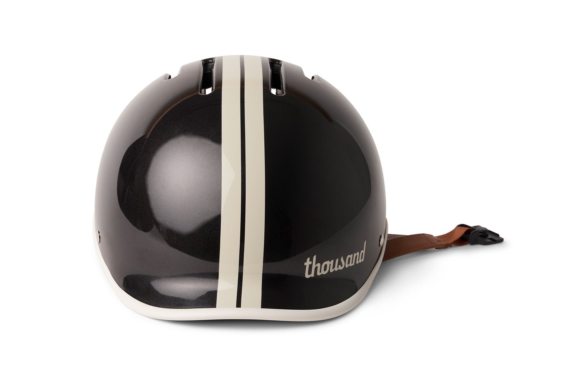 Black Thousand helmet with white stripe on a white background with brown chin strap