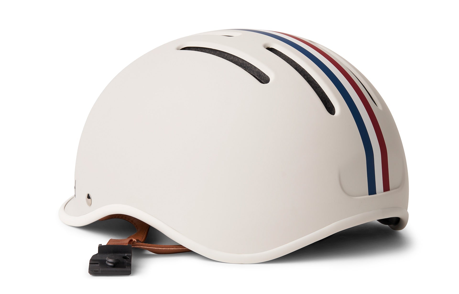 Close up of white helmet with red, blue and white stripe accents on front of helmet and brown strap