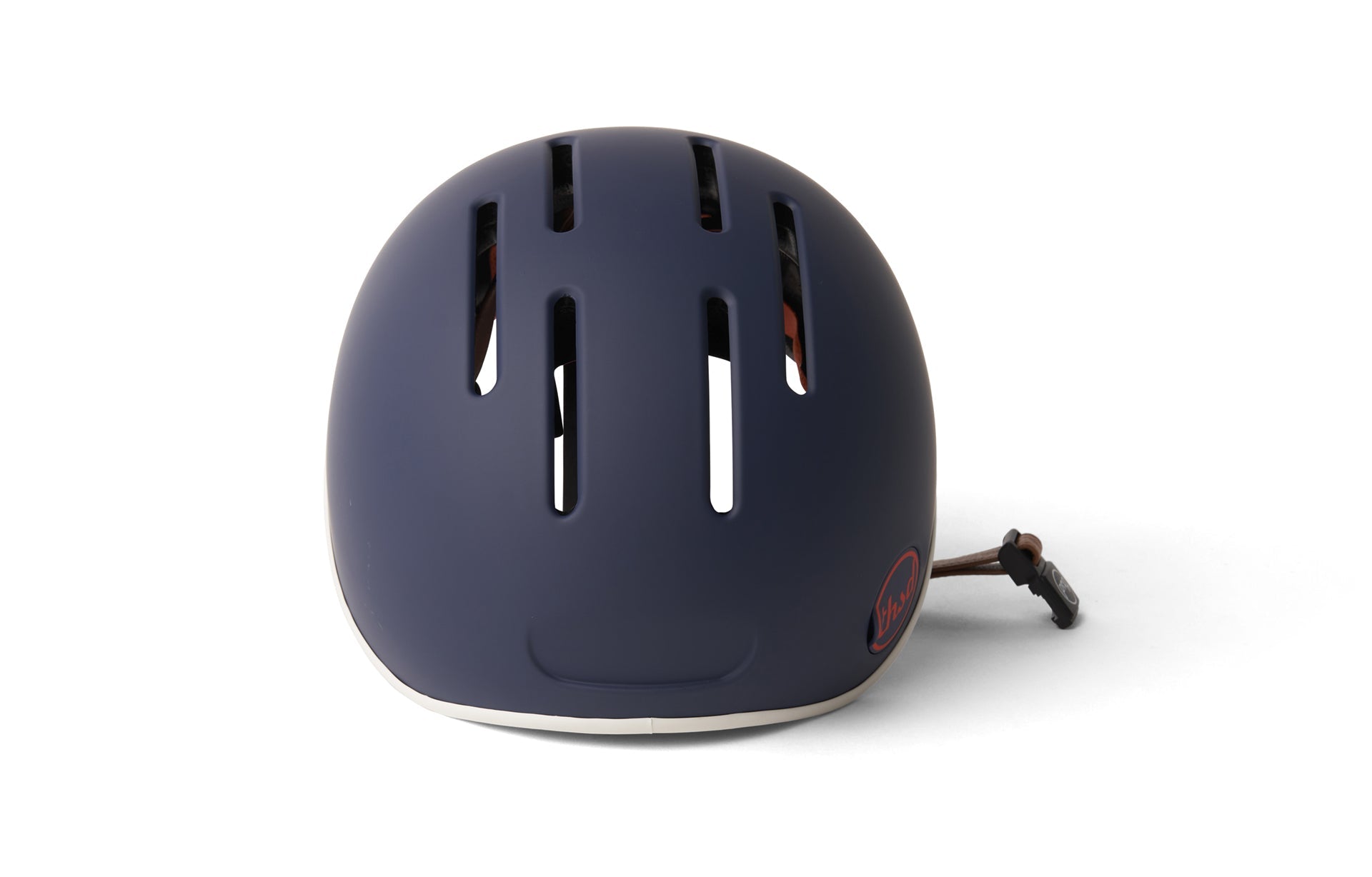 An electric blue bicycle helmet sitting on a white background with front facing us