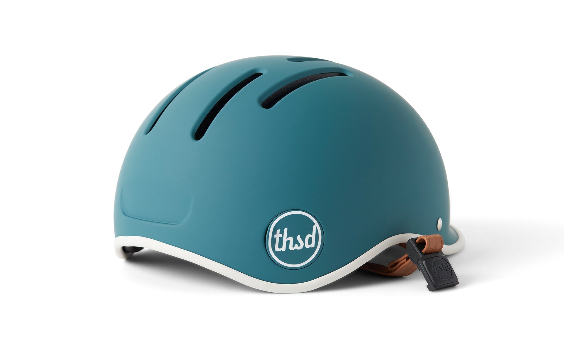 Teal helmet for children displaying with safety strap attached to the end
