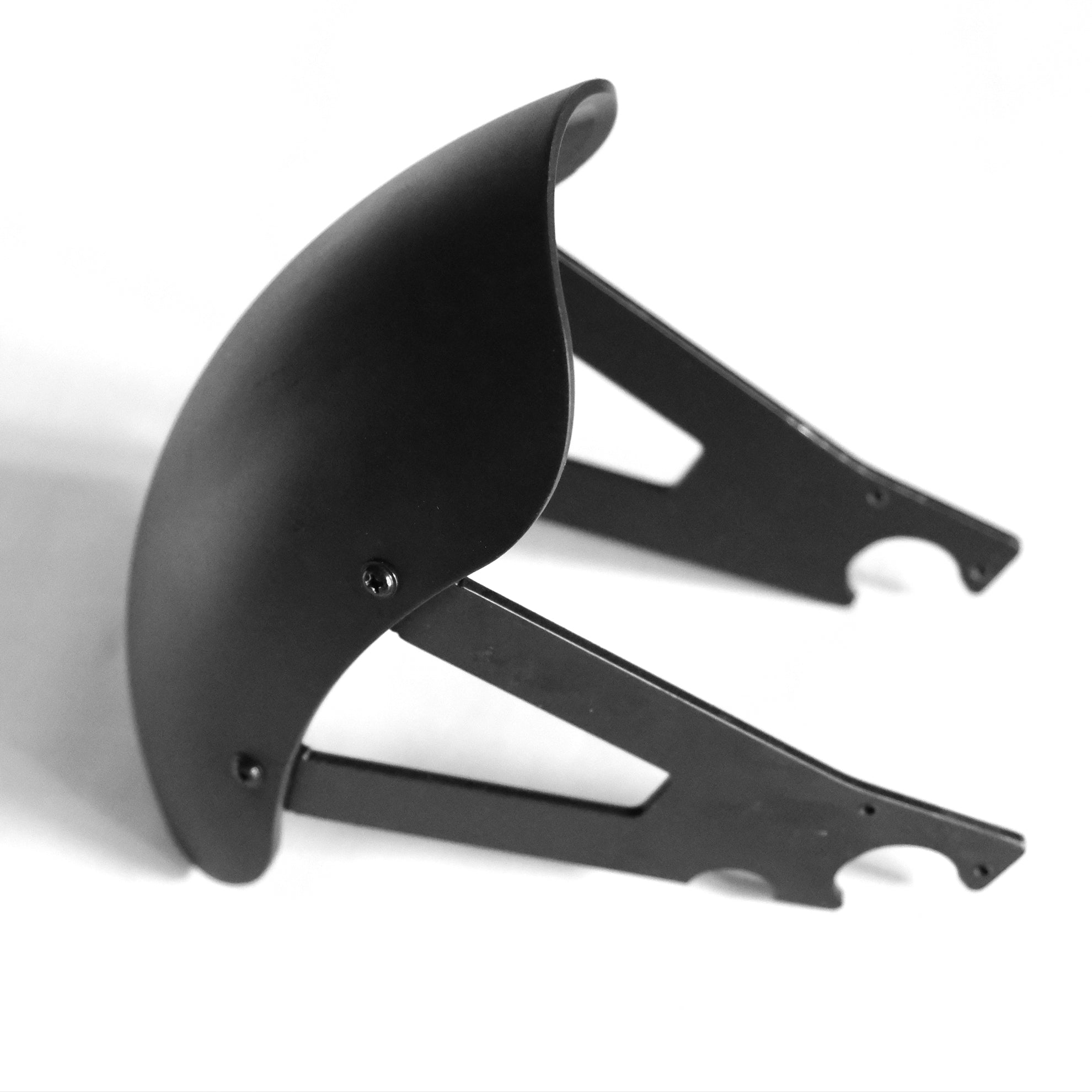 Black metal bike fairing guard on white background for better search engine exposure and understanding