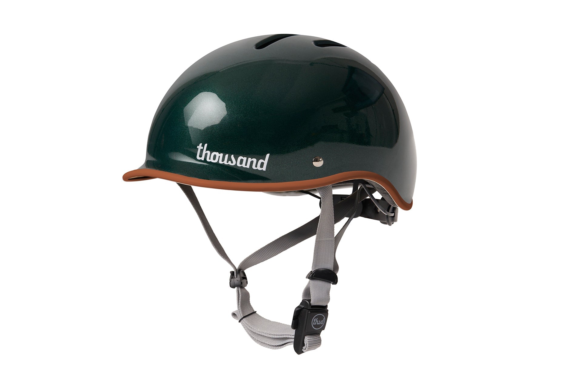 thousand helmet jade green with brown stitching over white background
