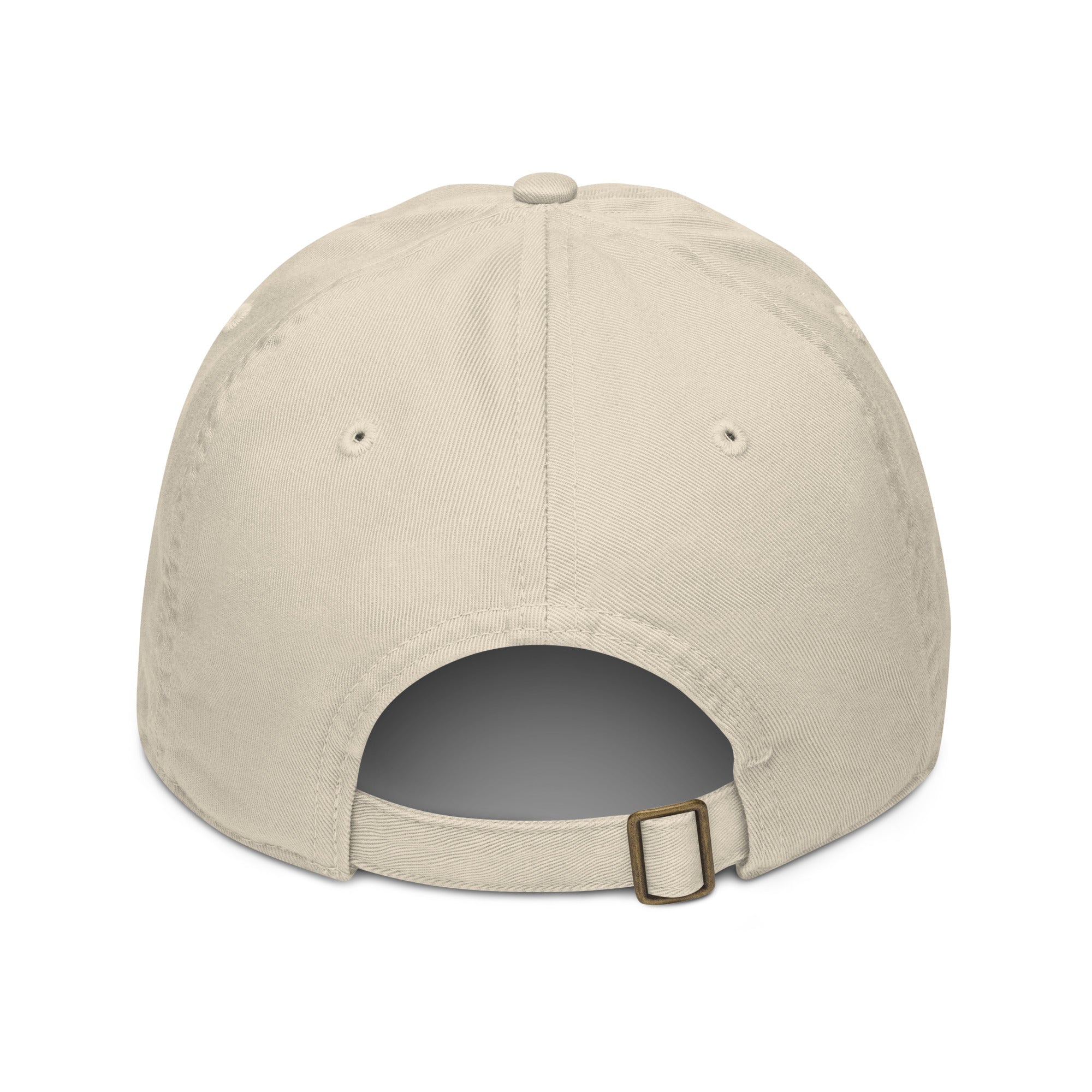 A beige baseball cap with a brown buckle isolated on a white background for a flat lay image view.