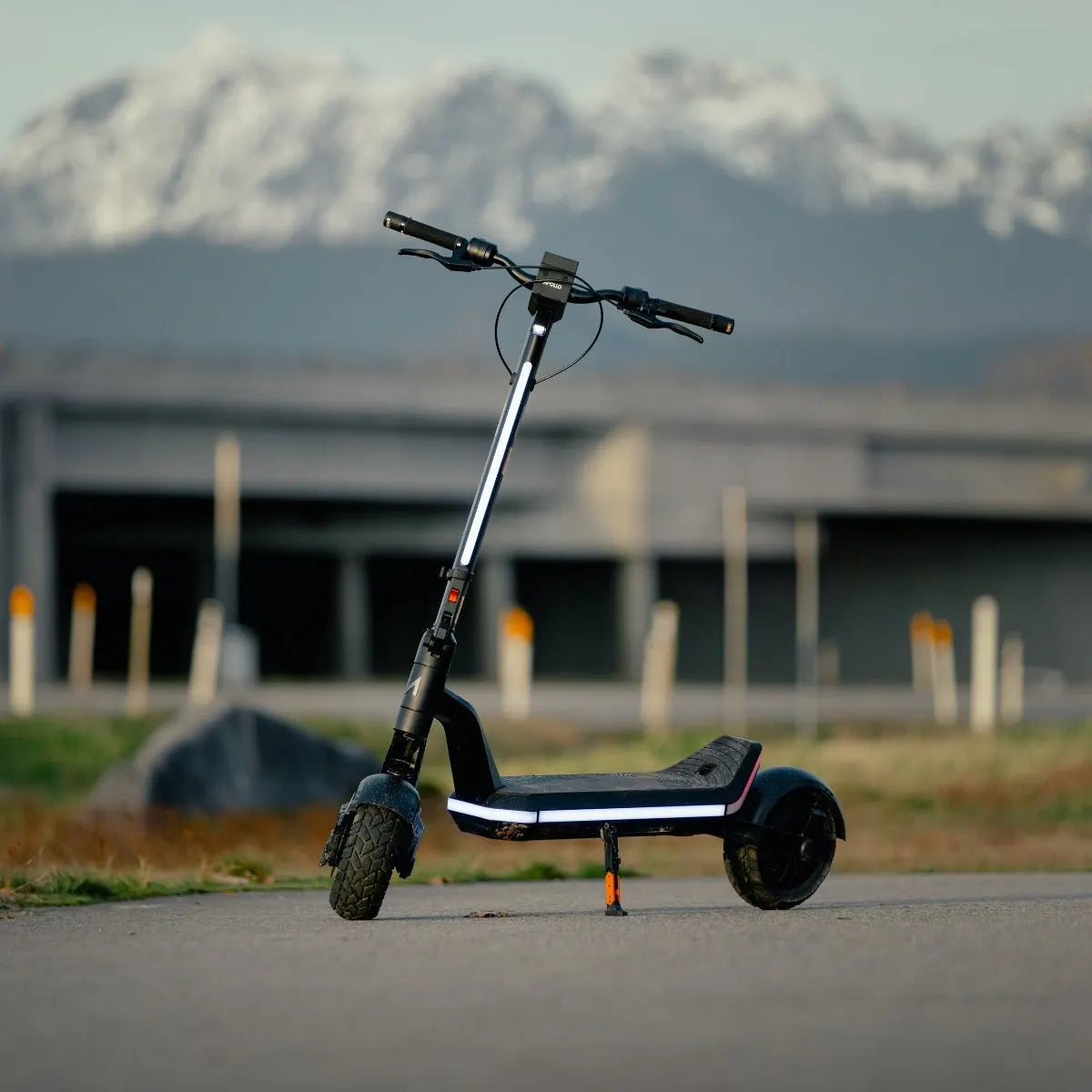 Apollo <tc>Phantom 2.0</tc> electric scooter, lifestyle photo, Black Friday price $2,199